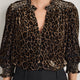 Close up of Alina leopard print blouse neckline and buttons