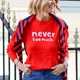 Cath X WYSE Slogan Jumper - Tomato Red