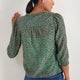 Back view of the jade green garden floral blouse.
