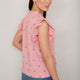 Back view of woman wearing Talya embroidered top