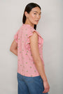 Back view of woman wearing Talya embroidered top